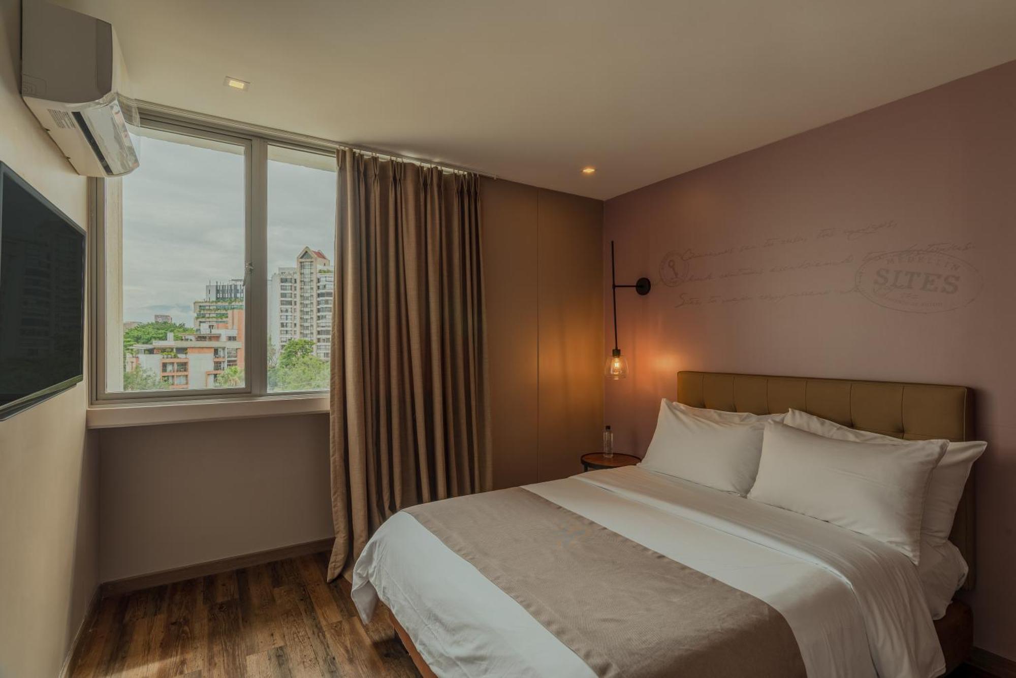 Sites Hotel Medellin Exterior photo A bedroom at the hotel