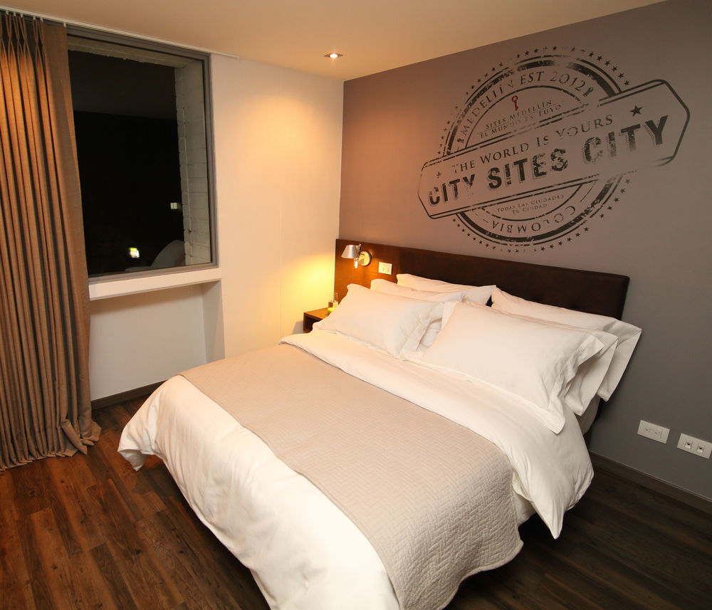 Sites Hotel Medellin Exterior photo A bedroom at the hotel