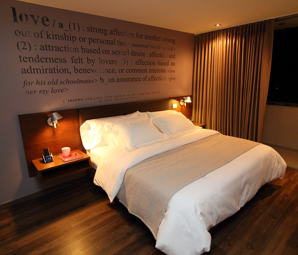 Sites Hotel Medellin Exterior photo A bedroom at the hotel